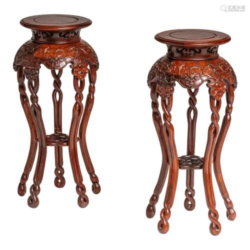 A pair of Chinese finely carved 'Lingzhi' hardwood stands, l...