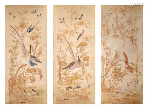 A set of three Chinese silk 'Birds in flower gardens' embroi...