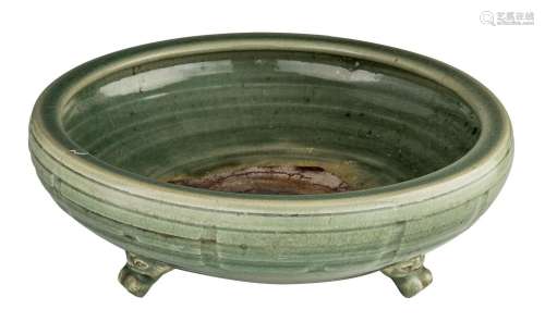 A Chinese longquan celadon tripod censer, late Yuan dynasty,...