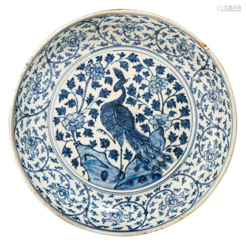 A Chinese Yuan-Ming style 'Phoenix in a garden' plate, ø 36,...