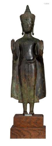 A Thai bronze figure of the standing Buddha Shakyamuni, pres...