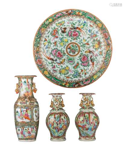 A collection of three Chinese Canton vases and a plate, 19th...