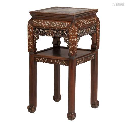 An (Indo-)Chinese carved and inlaid stand with a marble top,...