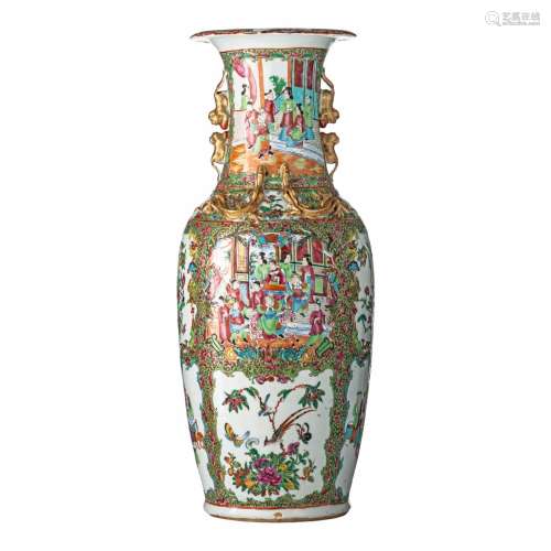 A Chinese Canton famille rose vase, paired with lion handles...