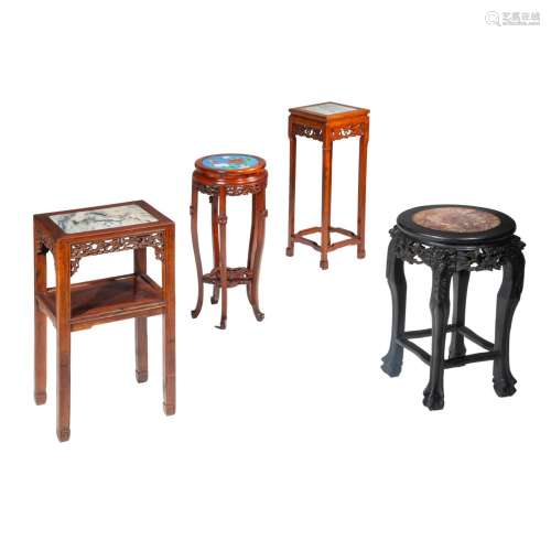 A collection of four high hardwood stands, three with a marb...