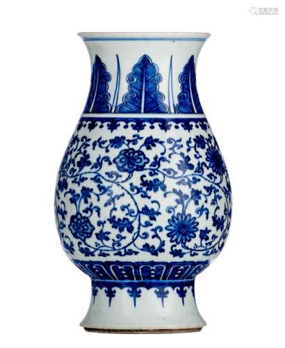 A Chinese blue and white 'Scrolling Lotus' footed vase, H 30...