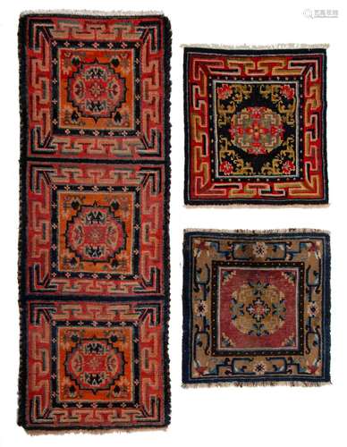 A collection of three Tibetan rugs, early 20thC, 72 x 185 cm...