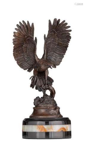 An Art Deco sculpture of an eagle, patinated bronze on a mar...