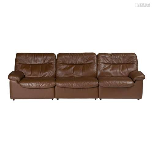 A three-piece brown leather DS66 modular sofa, by Carl Larss...