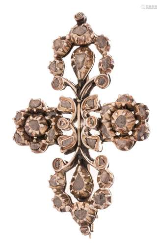 A silver and gold cross-shaped brooch, set with rose cut dia...