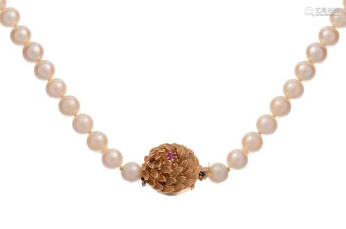 A pearl necklace with a 14ct gold floral-shaped extender, se...