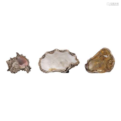 Three sterling silver coated shells by Frederico Buccellati,...