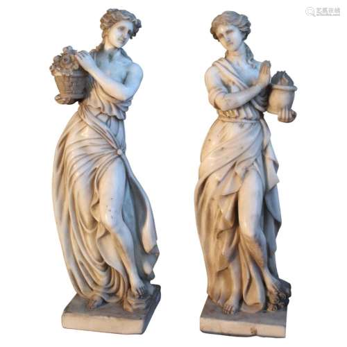 Allegory spring and summer marble sculptures.