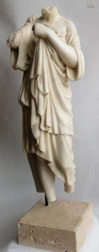 Female torso toga. Marble sculpture. In white marble.