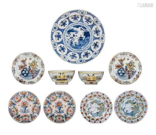 A large 18thC Delft Wanli-type charger, added Delft plates a...