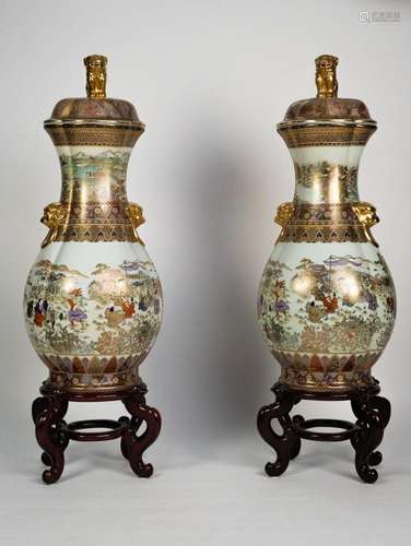 Pair of Satsuma vases. depicting scenes of everyday life