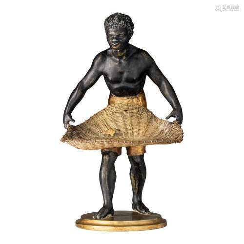 A cold-painted and gilt spelter sculpture of a blackamoor ho...