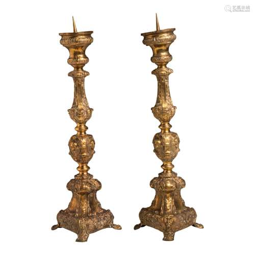 A large pair of Baroque style brass pricket church candlesti...
