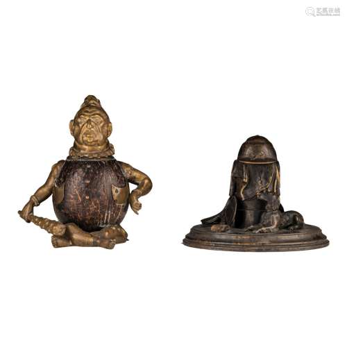 A brass and coconut figural inkwell, and a ditto patinated b...