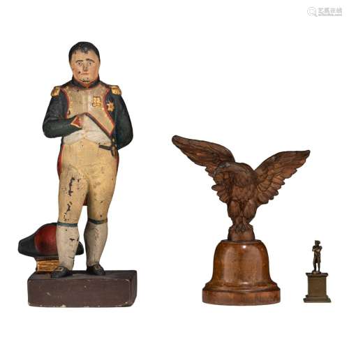 A collection of Napoleon figures and a matching eagle 'porte...