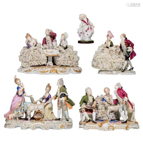 A collection of four Saxony porcelain groups of gallant figu...