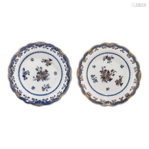 A pair of Tournai porcelain blue, white and gilt dishes with...