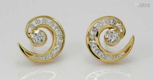 Ladies spiral design earrings in 14k yellow gold. 1.13tdw