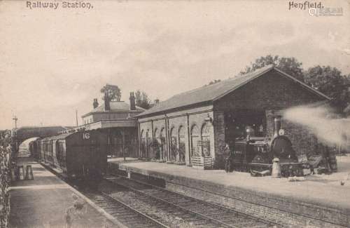 A photographic postcard titled 'Henfield Station' and anothe...