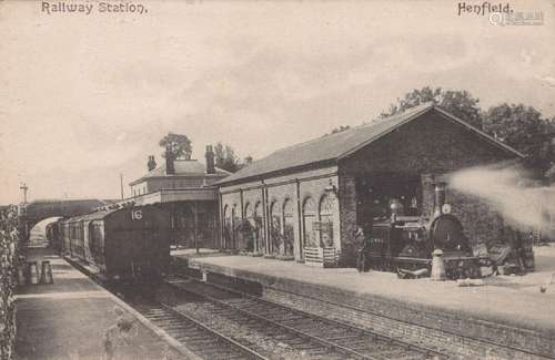 A photographic postcard titled 'Henfield Station' and anothe...