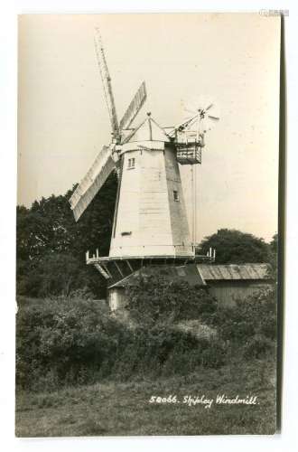 A collection of 23 postcards of West Sussex, including photo...