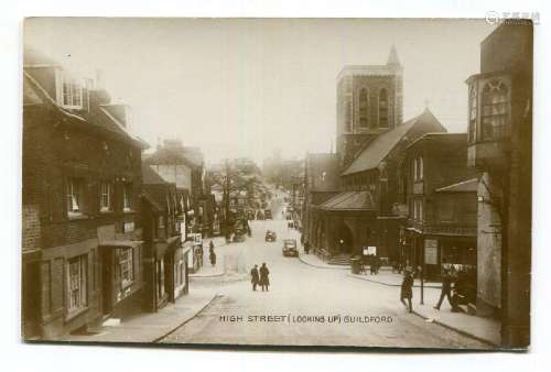 A collection of 49 postcards of Surrey, including photograph...