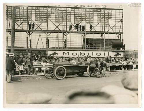 MOTOR RACING. A collection of 30 black and white photographs...