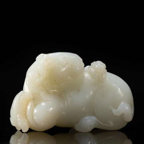 A CARVED JADE FIGURE OF HORSE AND MONKEY