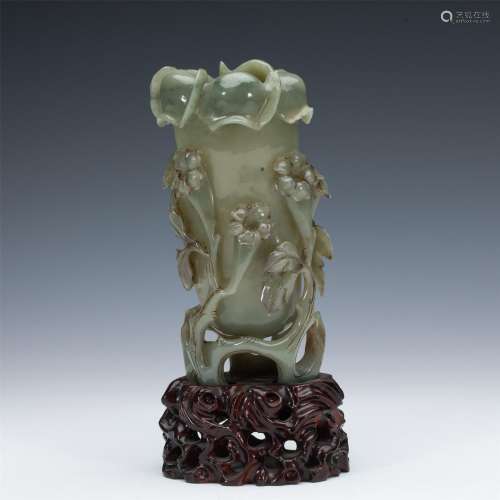 A CHINESE CARVED JADE ORCHID VASE