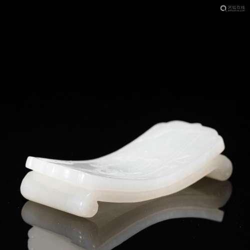 A CHINESE CARVED JADE BRUSH-REST