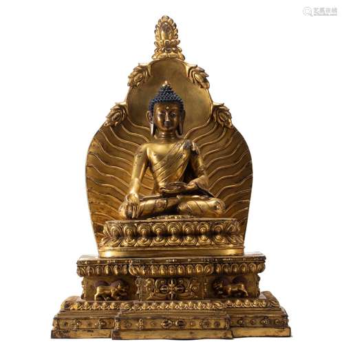 A CHINESE BRONZE-GILT FIGURE OF BUDDHA