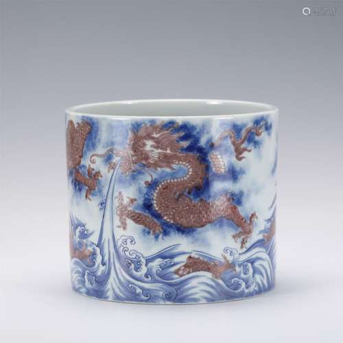 A CHINESE BLUE AND WHITE UNDERGLAZE RED PORCELAIN BRUSH POT,...