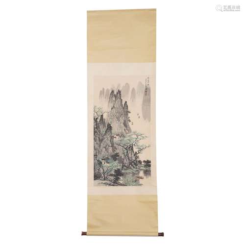 A SCROLL PAINTING OF GREEN MOUNTAINS AND RIVER LANDSCAPE