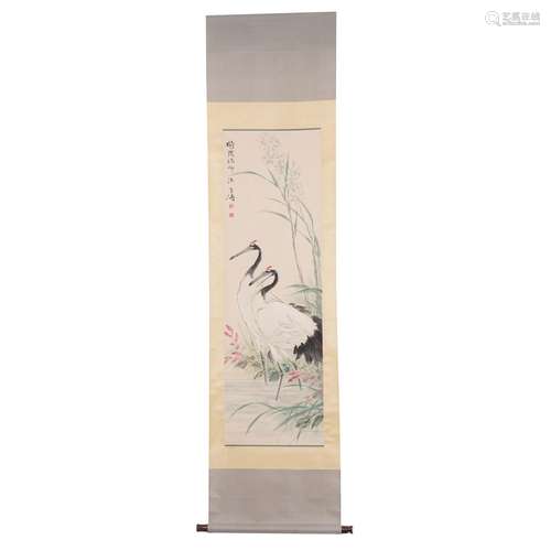 A SCROLL PAINTING OF CRANES,SIGNED WANG XUETAO