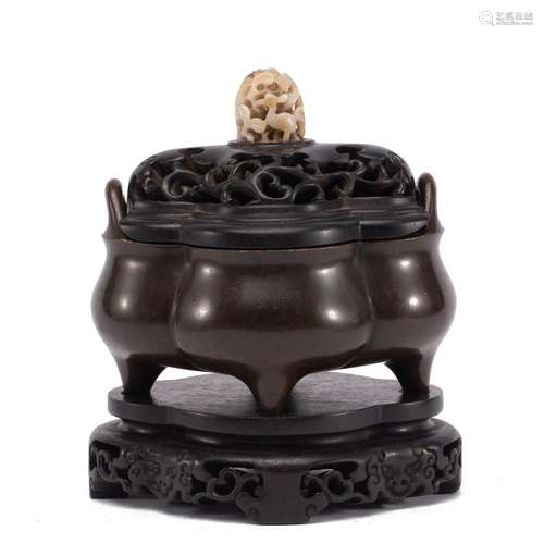 A CHINESE BRONZE LOBED CENSER