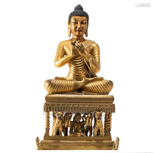 A CHINESE BRONZE-GILT FIGURE OF SHAKYAMUNI