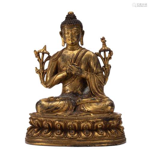 A BRONZE-GILT FIGURE OF MAITREYA BUDDHA