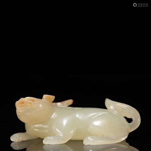 A CHINESE CARVED JADE BEAST