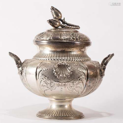 A SILVER POT WITH COVER