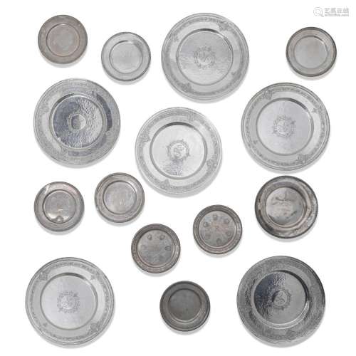 THIRTY-ONE AMERICAN STERLING SILVER PLATES by various makers...