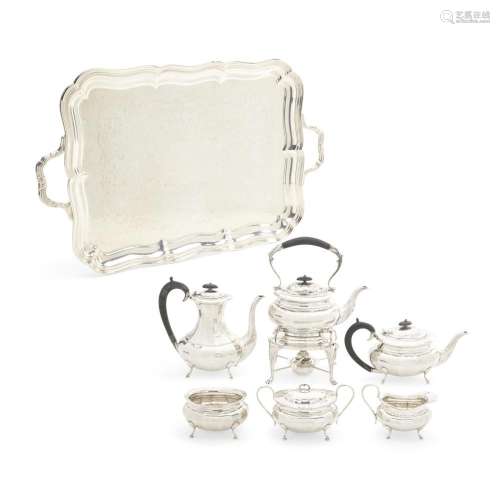 AN ENGLISH SILVER SEVEN-PIECE TEA AND COFFEE SERVICE by Emil...
