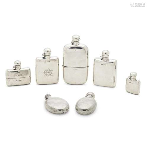 SEVEN ENGLISH SILVER FLASKS by various makers, 19th-20th cen...
