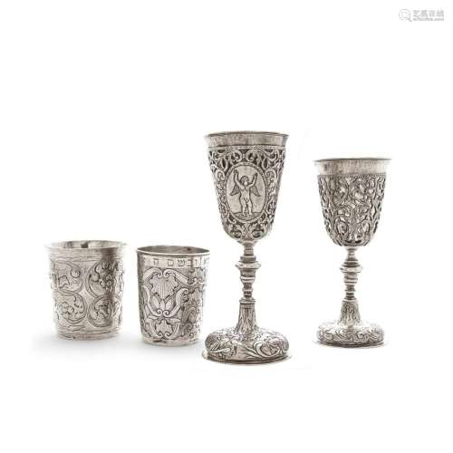 FOUR RUSSIAN 875 STANDARD SILVER GOBLETS AND CUPS by various...