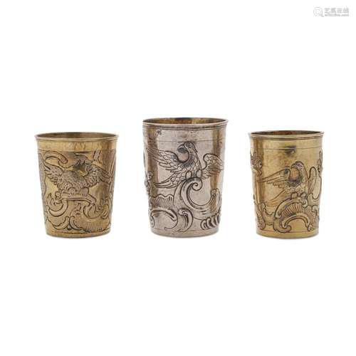 THREE RUSSIAN 875 STANDARD SILVER AND SILVER-GILT BEAKERS by...