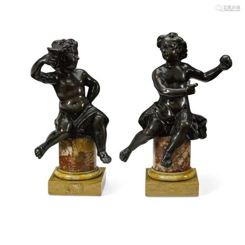 A PAIR OF CONTINENTAL PATINATED BRONZE FIGURES OF PUTTI18th ...